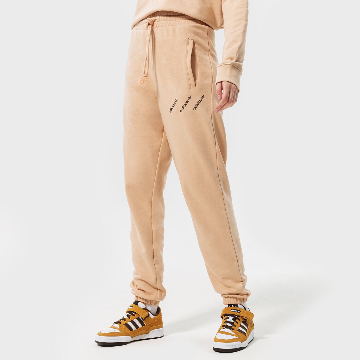 dámské kalhoty ADIDAS KALHOTY  TRACK PANTS HM4871 BÉŽOVÁ