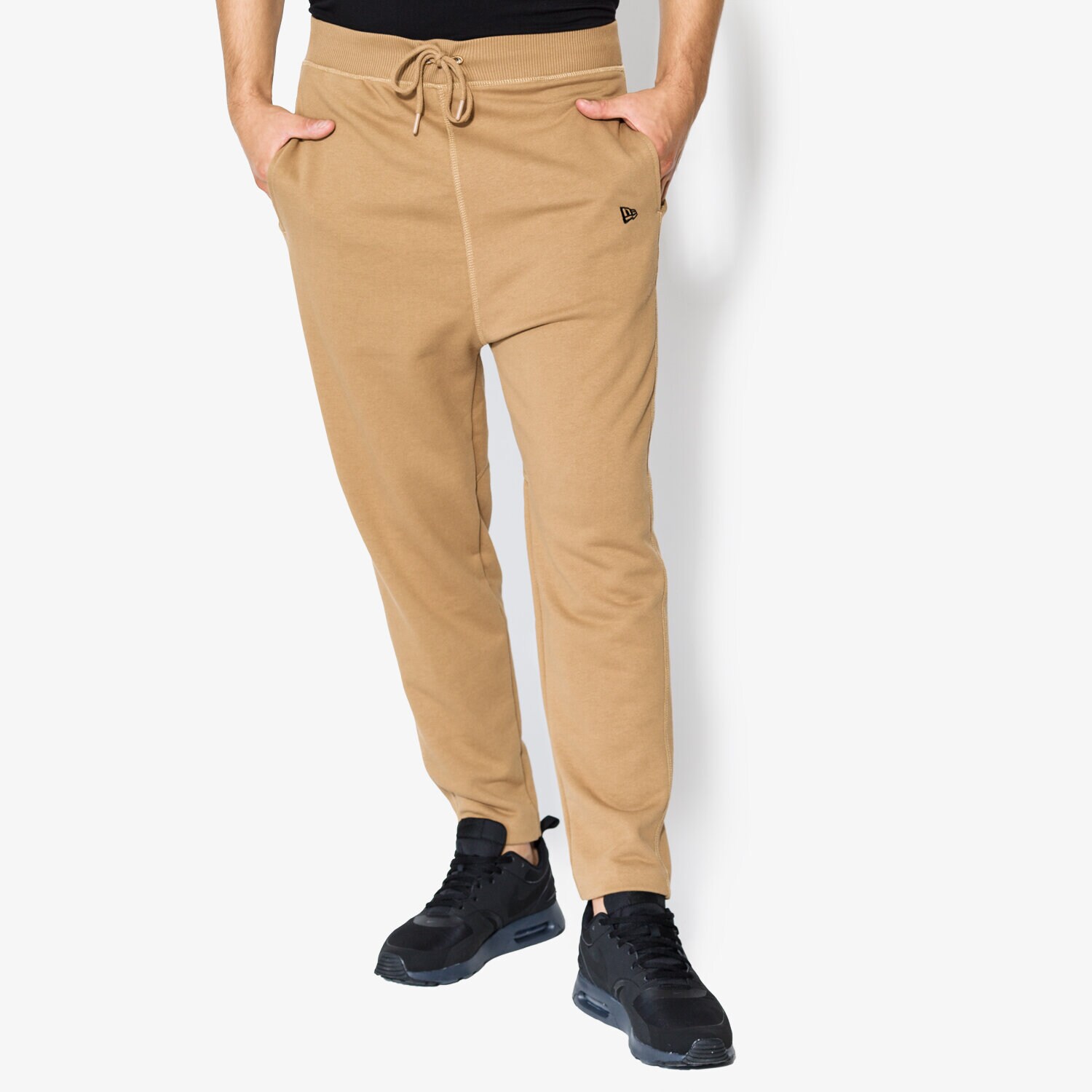 pánské kalhoty NEW ERA KALHOTY  ORIGINATORS TRK PANT NE KHK 11459476 BÉŽOVÁ