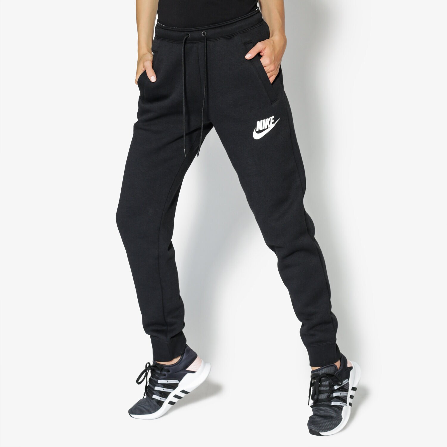 dámské kalhoty NIKE KALHOTY  W NSW RALLY PANT REG 894850-010 ČERNÁ