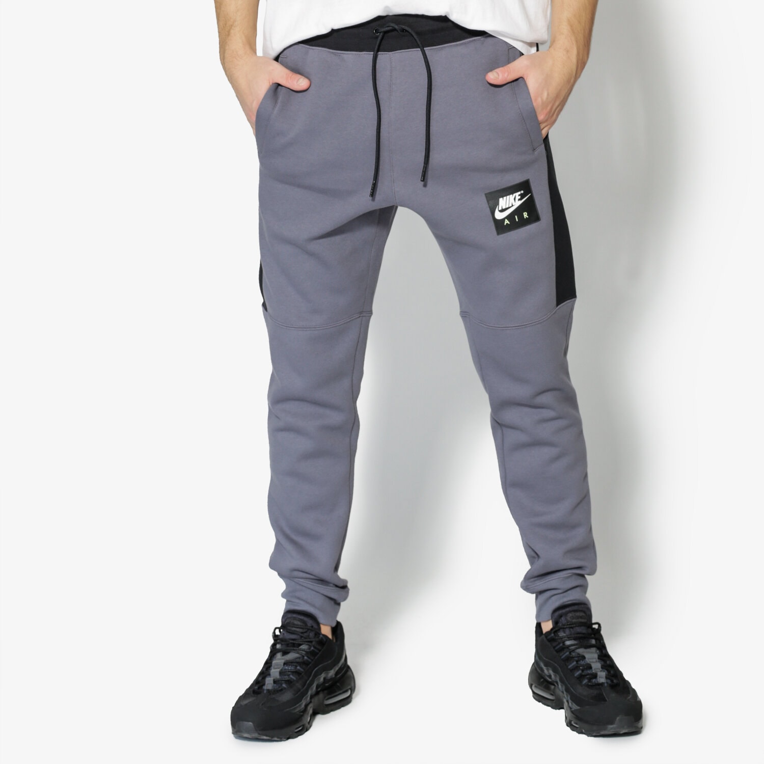 pánské kalhoty NIKE KALHOTY  M NSW JGGR AIR FLC 886048-021 ŠEDÁ