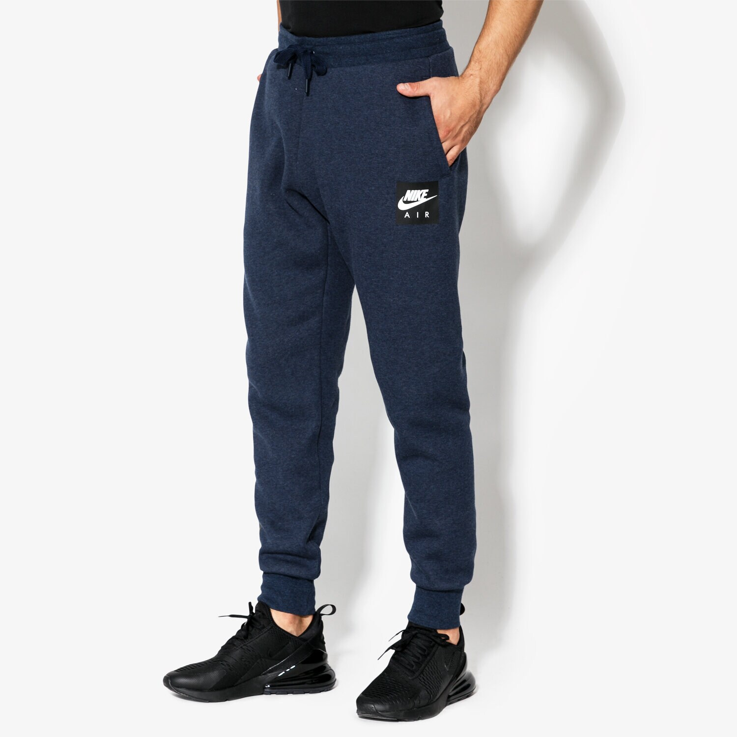 pánské kalhoty NIKE KALHOTY  M NSW PANT FLC NIKE AIR 928637-473 TMAVOMODRÁ