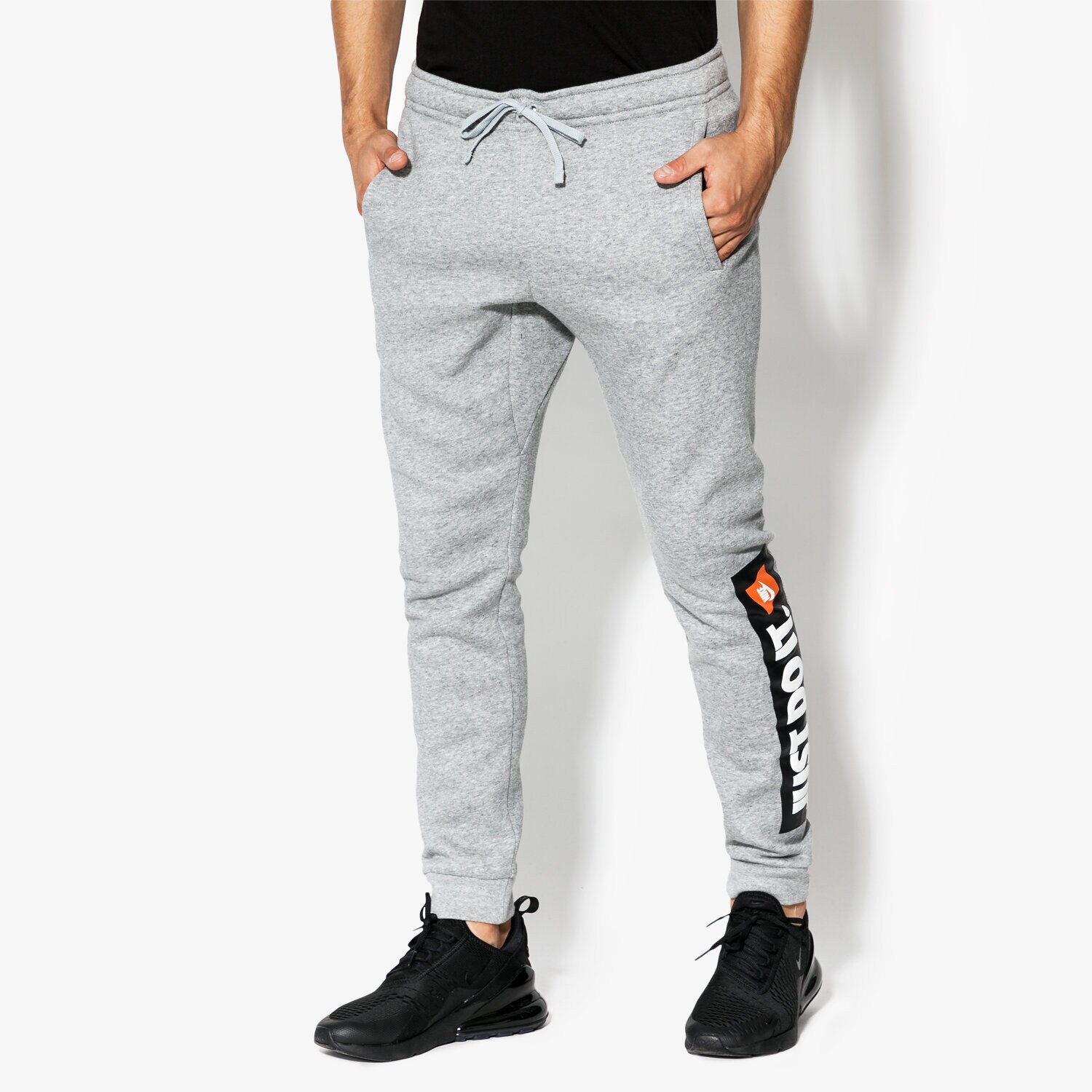 pánské kalhoty NIKE KALHOTY  M NSW JGGR FLC HBR 928725-063 ŠEDÁ