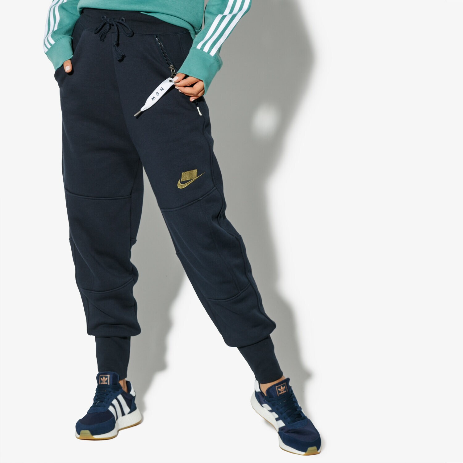 dámské kalhoty NIKE KALHOTY  W NSW PANT FLC JOGGER NSW AH4005-475 TMAVOMODRÁ