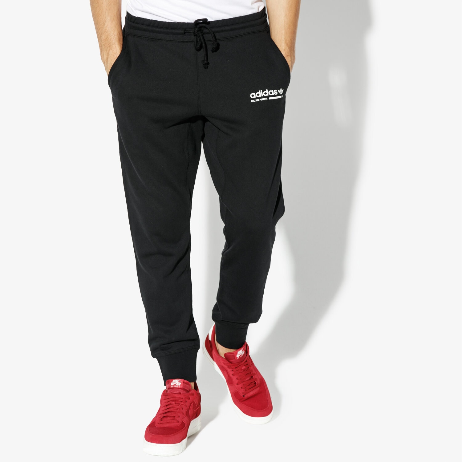 pánské kalhoty ADIDAS KALHOTY  KAVAL SWEATPANT ORIGINALS CORE DH4936 ČERNÁ