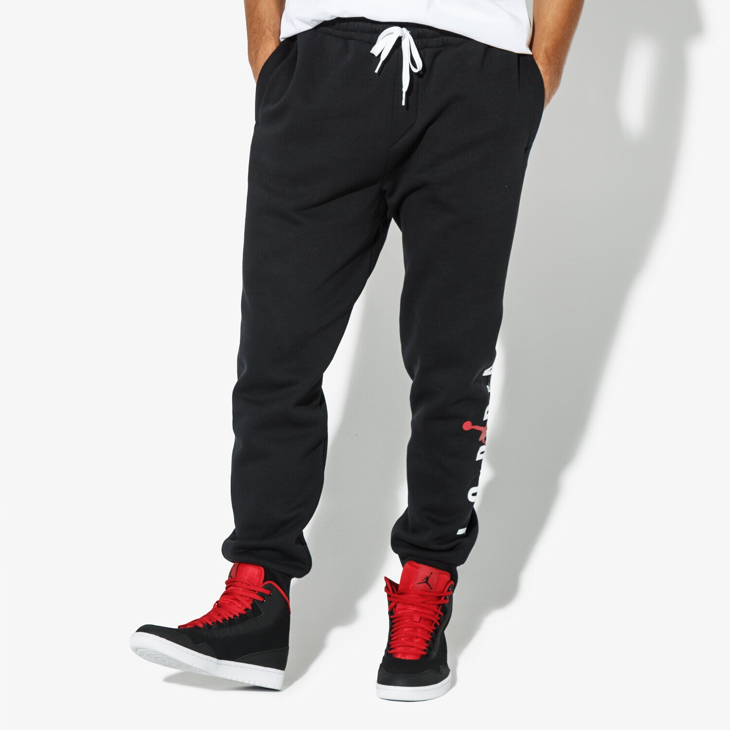pánské kalhoty JORDAN KALHOTY  JUMPMAN AIR GFX FLEECE PANT AA1454-010 ČERNÁ