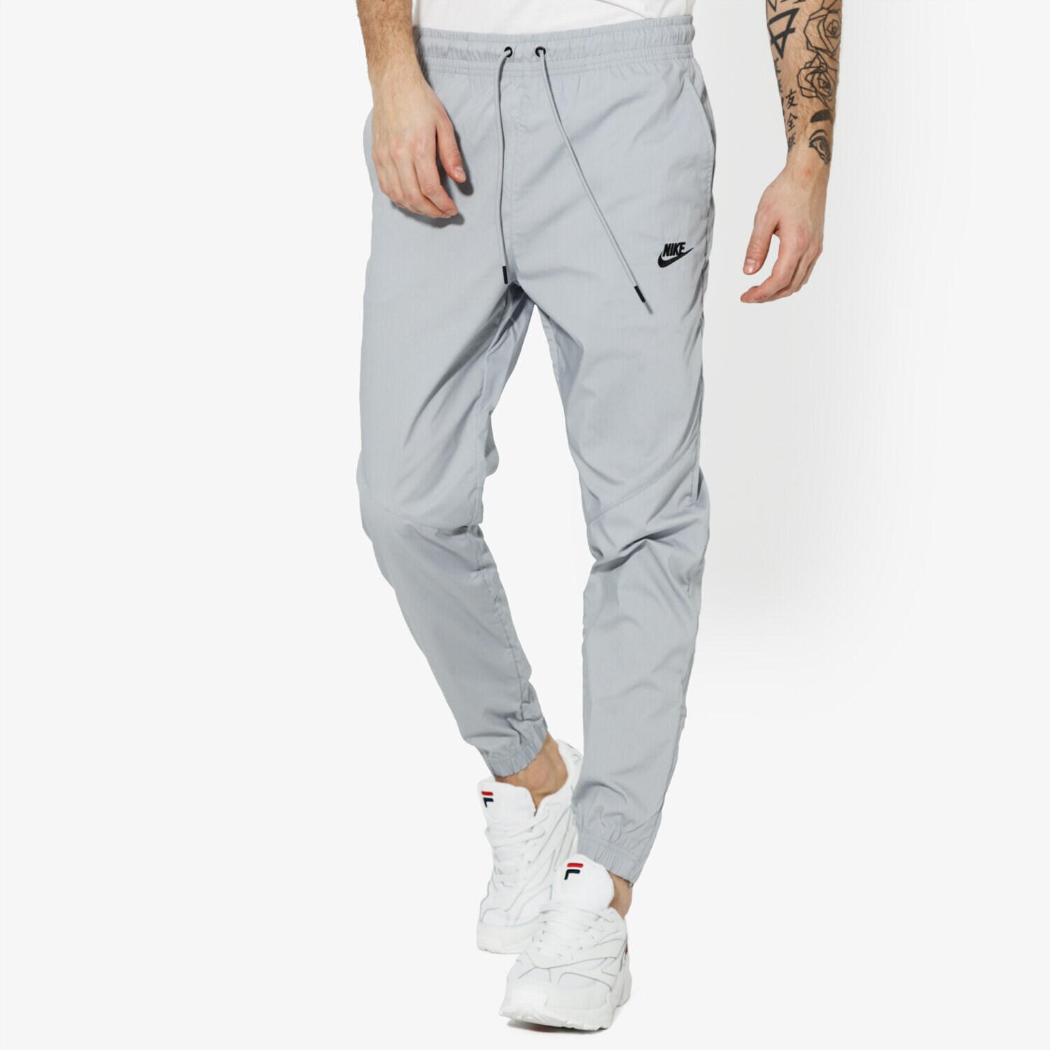pánské kalhoty NIKE KALHOTY  M NSW PANT WR STREET SPORTSWEAR AR2368-012 ŠEDÁ