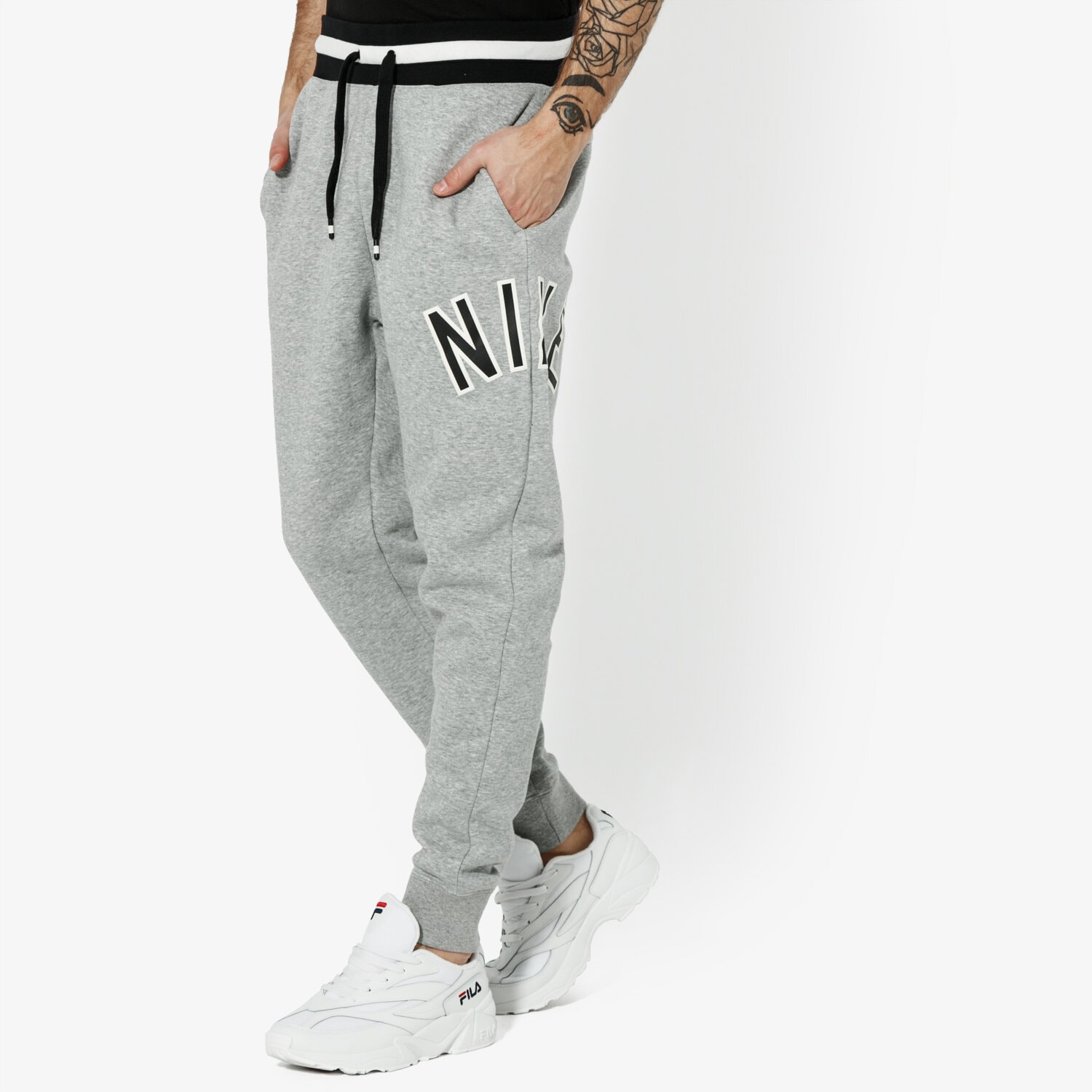 pánské kalhoty NIKE KALHOTY  M NSW NIKE AIR PANT FLC SPORTSWEAR AR1824-063 ŠEDÁ