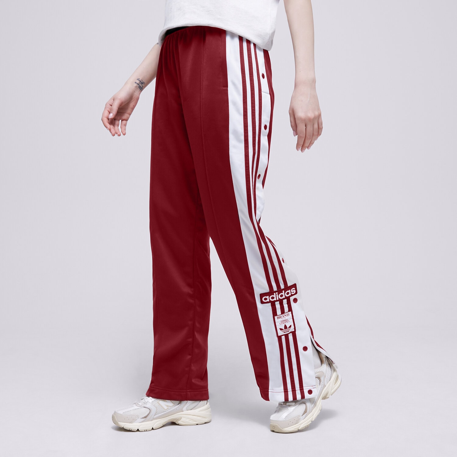 dámské kalhoty ADIDAS KALHOTY  ADIBREAK TP IB7297 ČERVENÁ