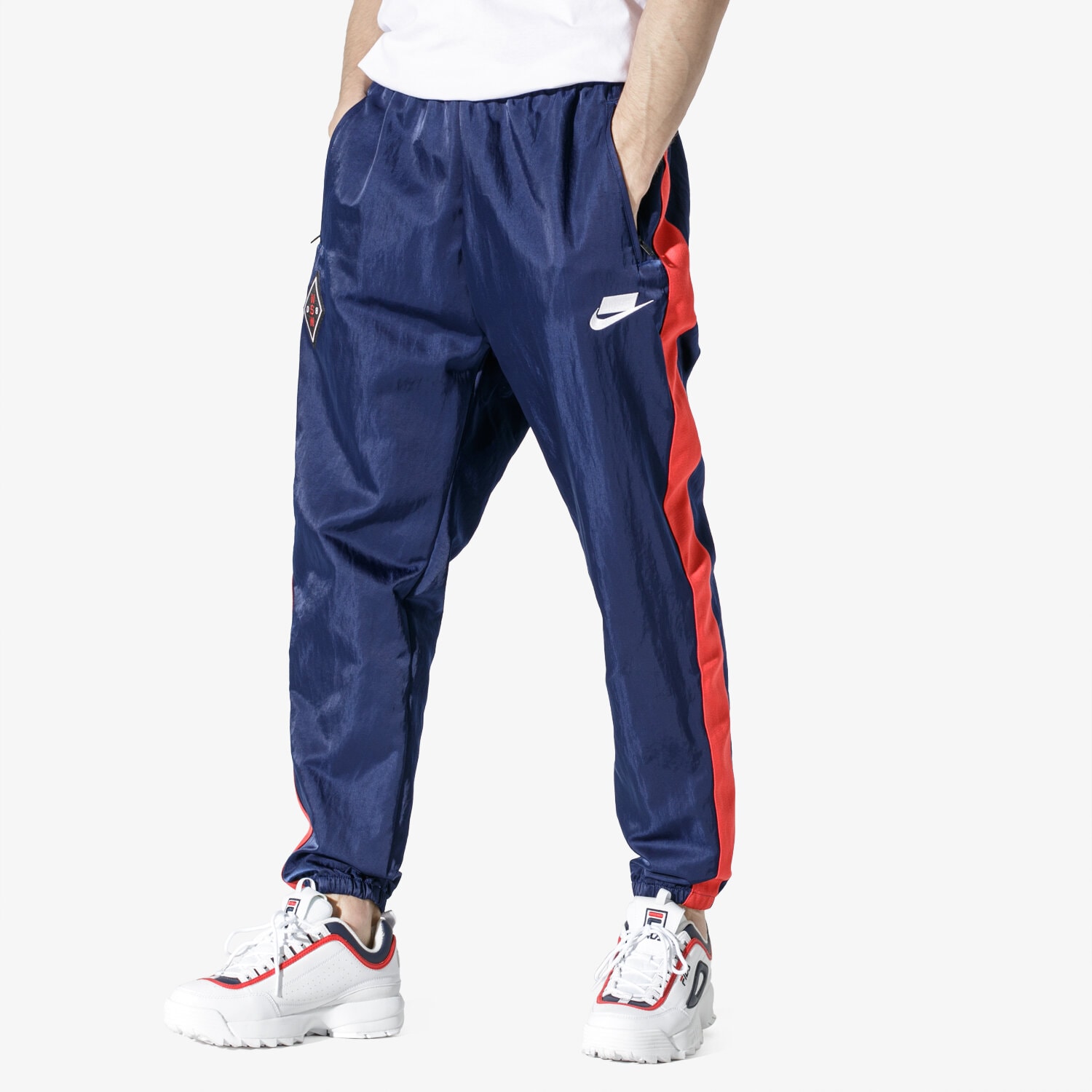 pánské kalhoty NIKE KALHOTY  M NSW NSP PANT WVN AR1628-492 TMAVOMODRÁ