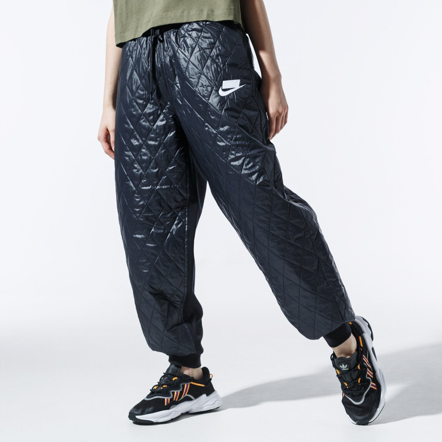 dámské kalhoty NIKE KALHOTY  W NSW NSP QLTD PANT CJ6256-010 ČERNÁ