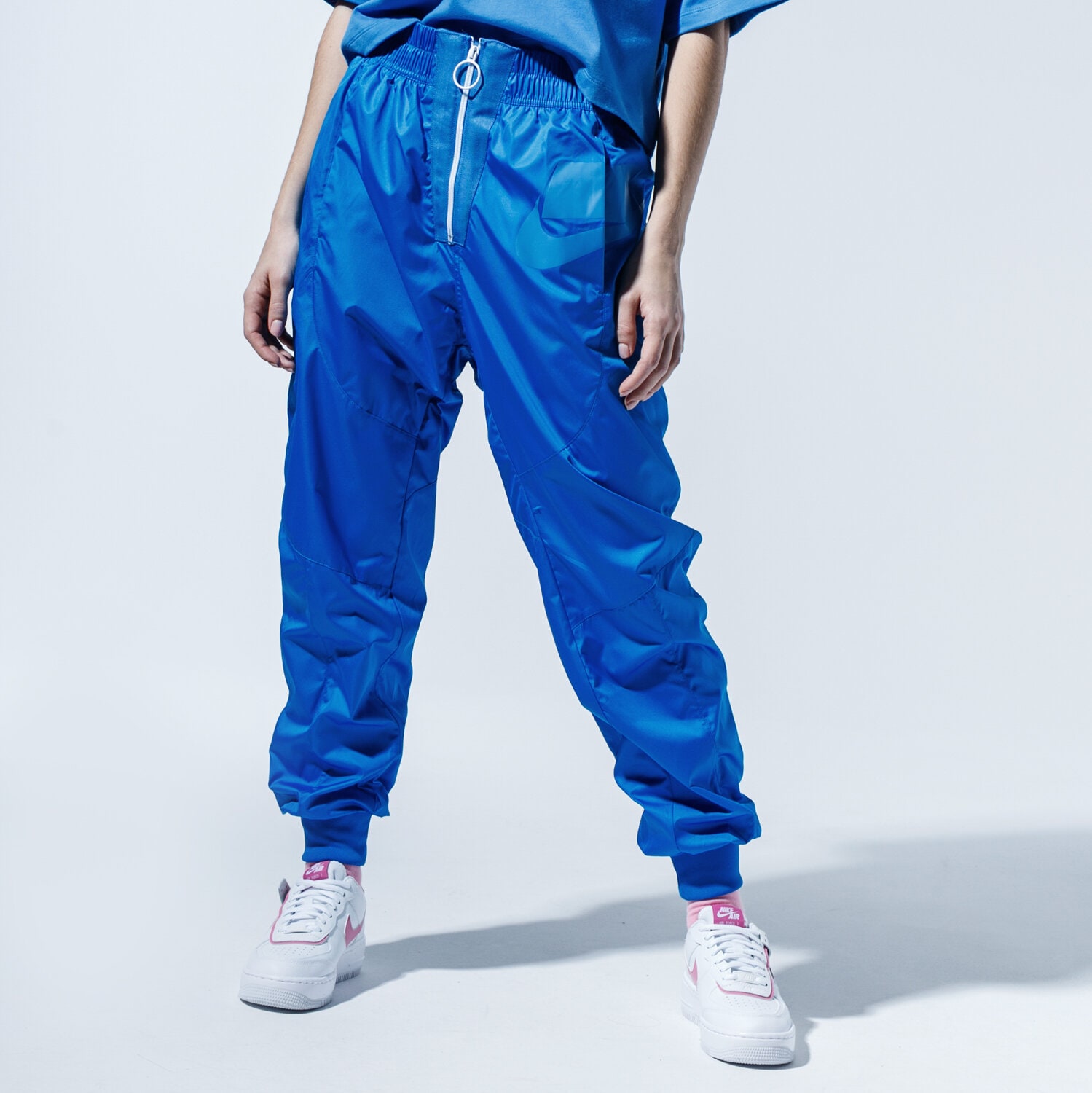 dámské kalhoty NIKE KALHOTY  W NSW NSW PANT WVN CT0880-453 MODRÁ