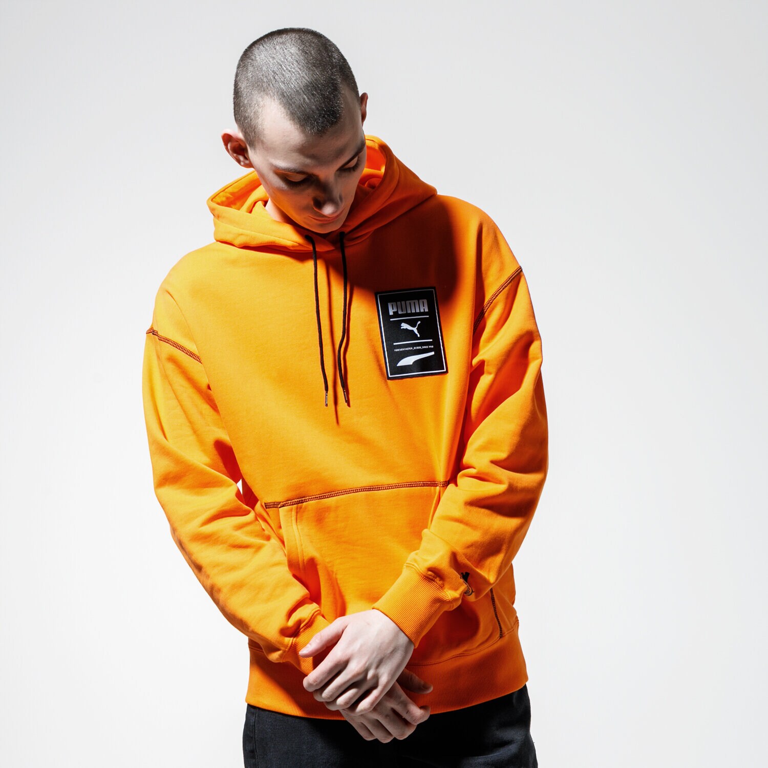 pánská mikina PUMA MIKINA S KAPUCÍ RECHECK PACK GRAPHIC HOODIE 59788680 ORANŽOVÁ