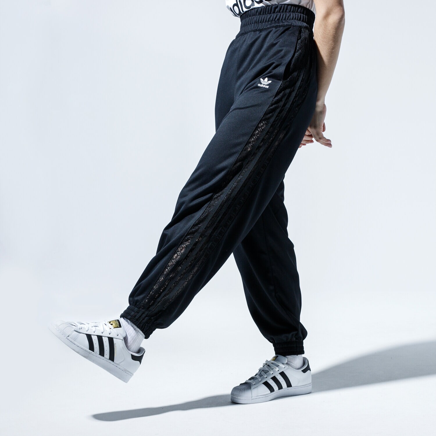 dámské kalhoty ADIDAS KALHOTY  TRACKPANT FL4125 ČERNÁ