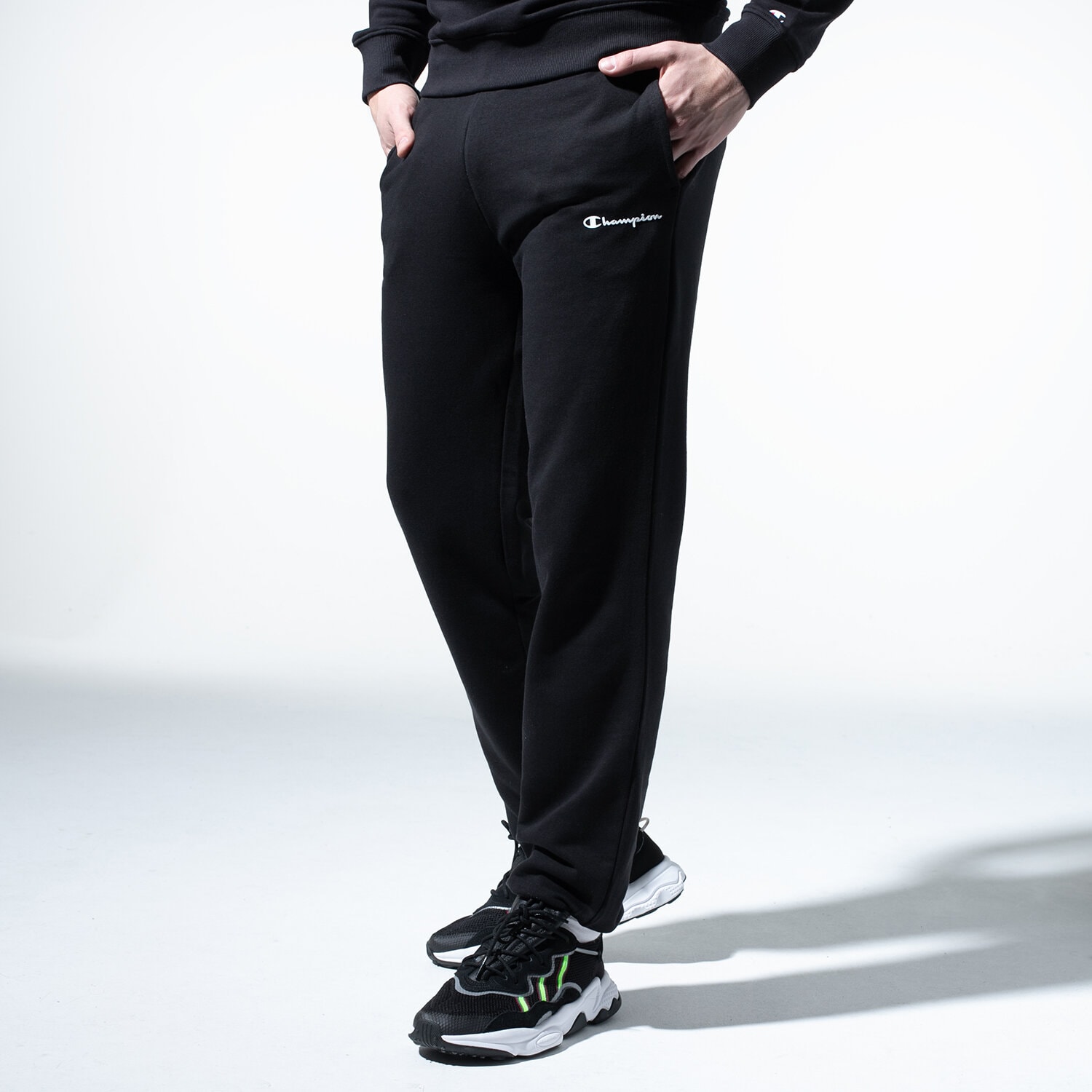 pánské kalhoty CHAMPION KALHOTY  BASIC CUFF PANTS 214538KK001 ČERNÁ