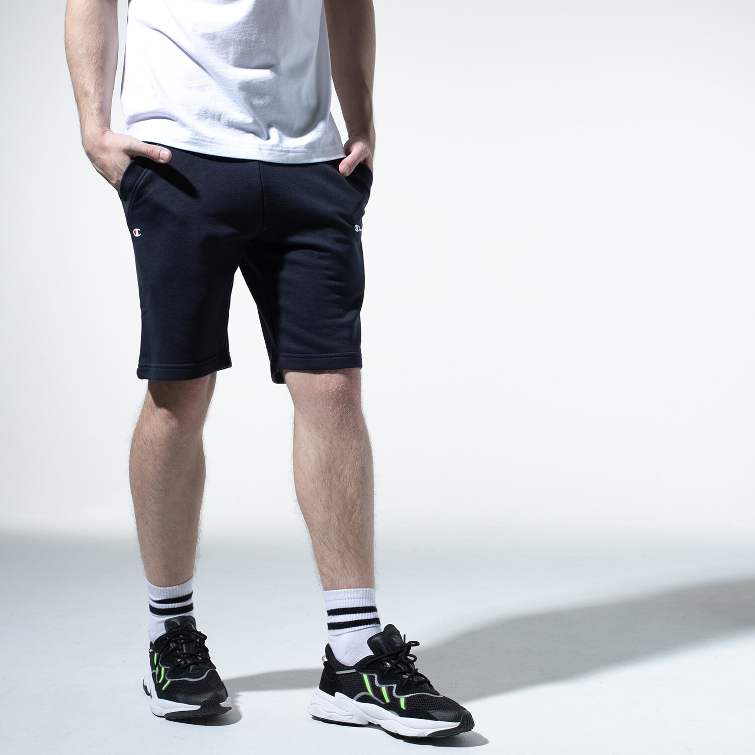 pánské kraťasy CHAMPION ŠORTKY  LOGO SHORTS 215497BS501 TMAVOMODRÁ