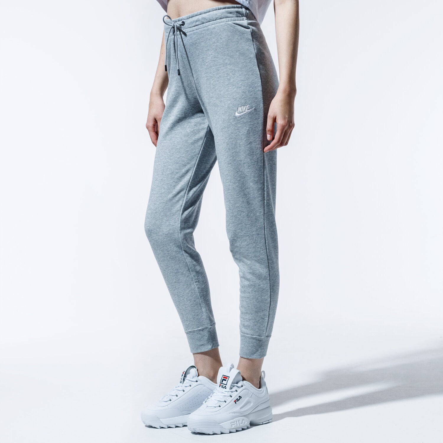 dámské kalhoty NIKE KALHOTY  SPORTSWEAR ESSENTIAL BV4099-063 ŠEDÁ