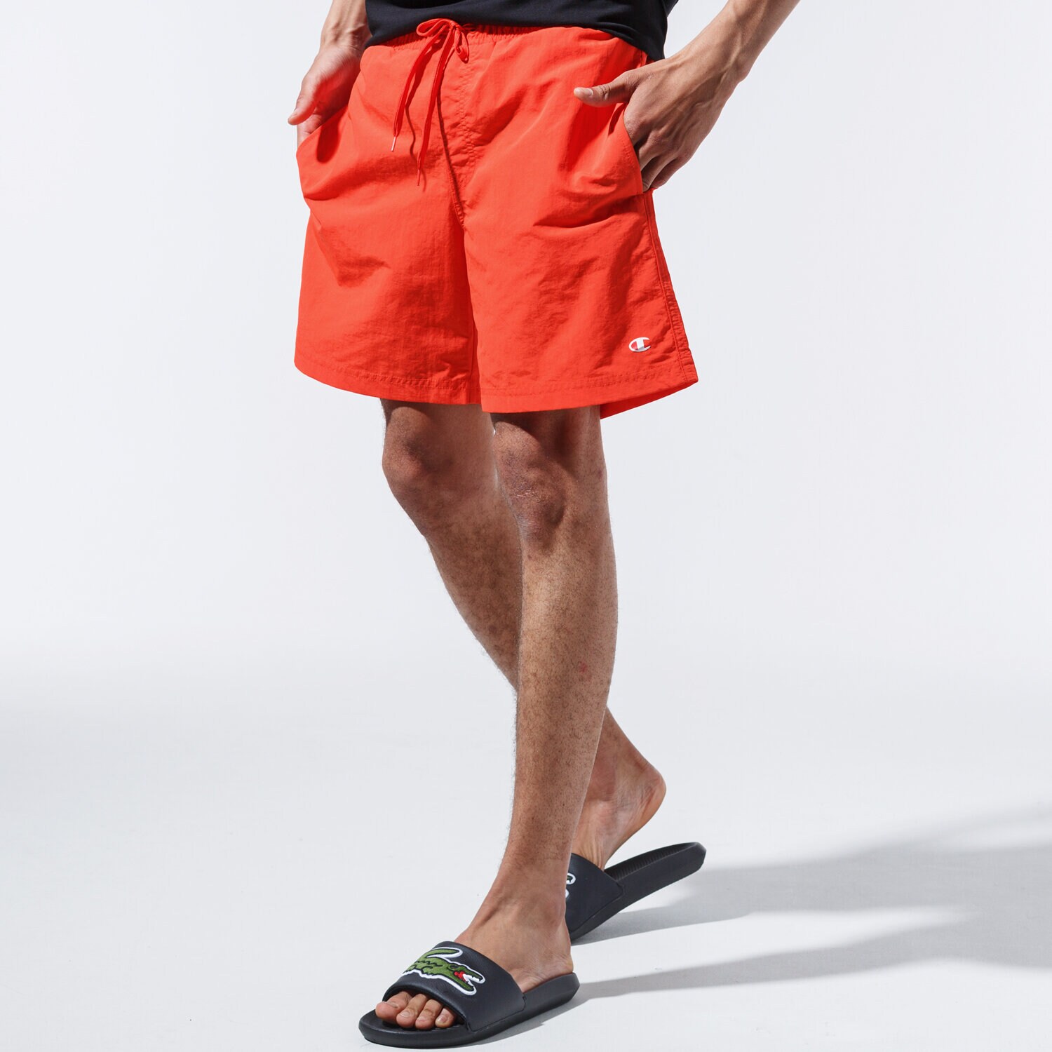 pánské kraťasy CHAMPION ŠORTKY  BASIC SWIM SHORTS 215498YS057 ORANŽOVÁ