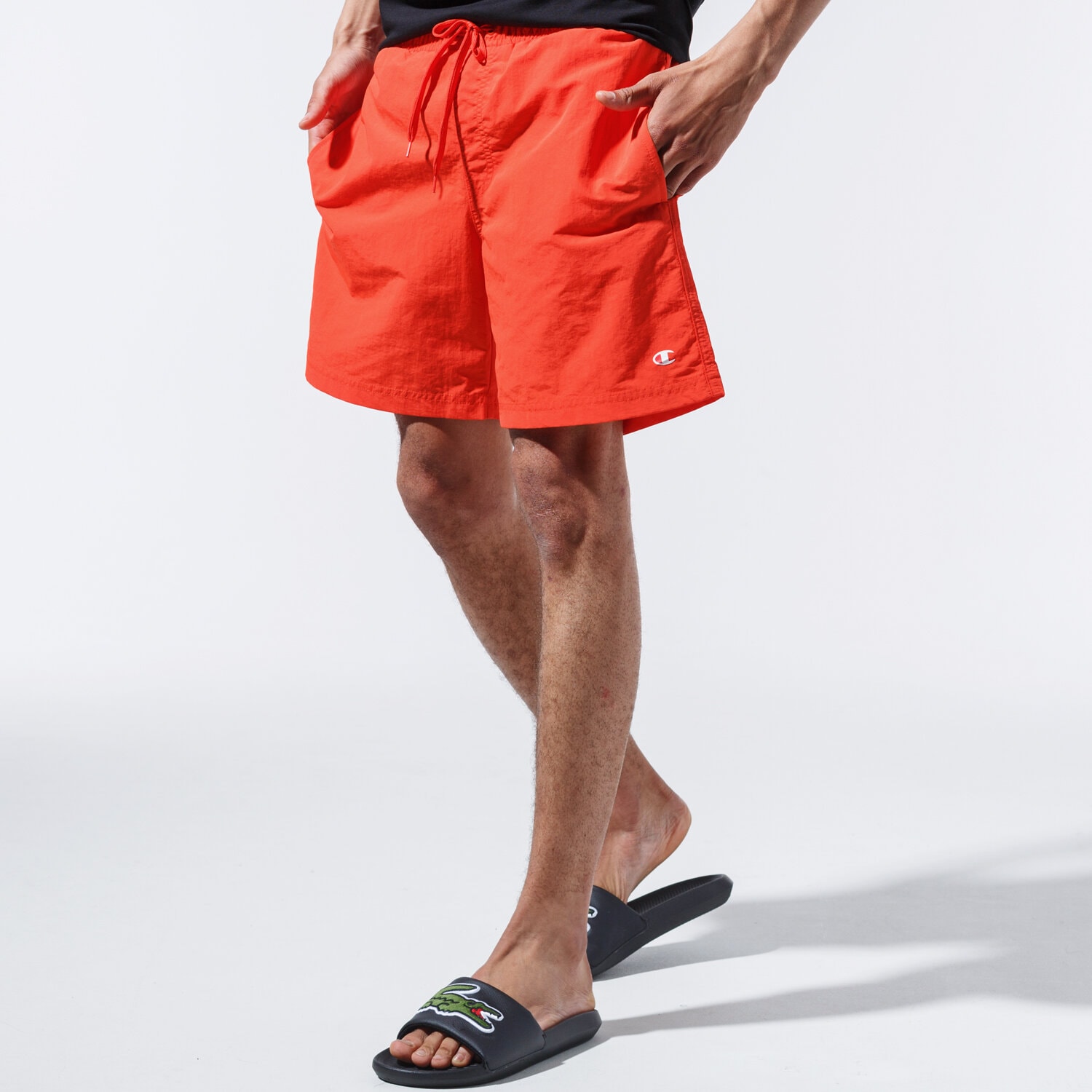 pánské kraťasy CHAMPION ŠORTKY  BASIC SWIM SHORTS 215498YS057 ORANŽOVÁ
