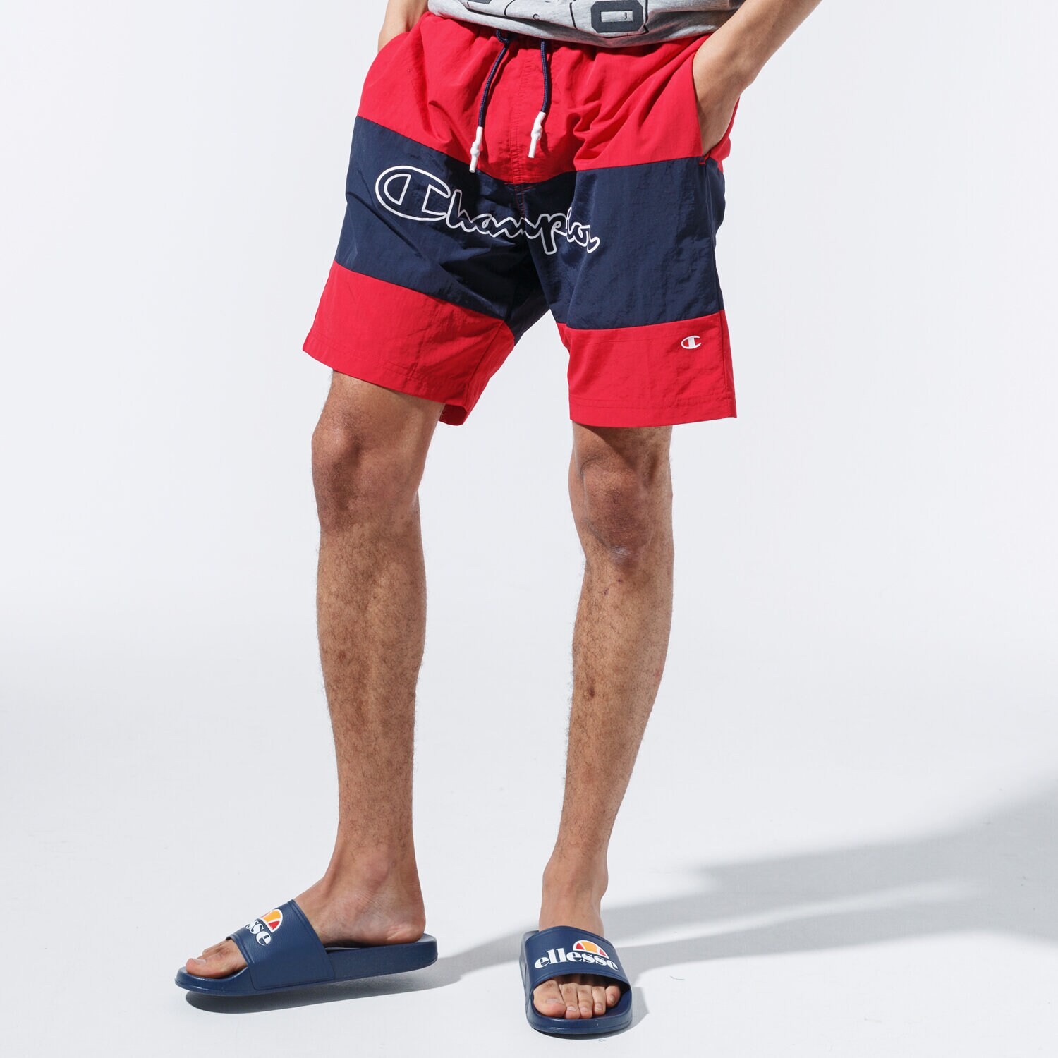 pánské kraťasy CHAMPION ŠORTKY  LOGO SWIM SHORTS 215499RS001 ČERVENÁ
