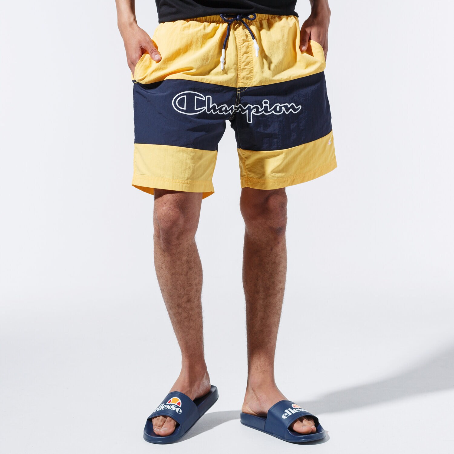 pánské kraťasy CHAMPION ŠORTKY  LOGO SWIM SHORTS 215499YS001 ŽLUTÁ