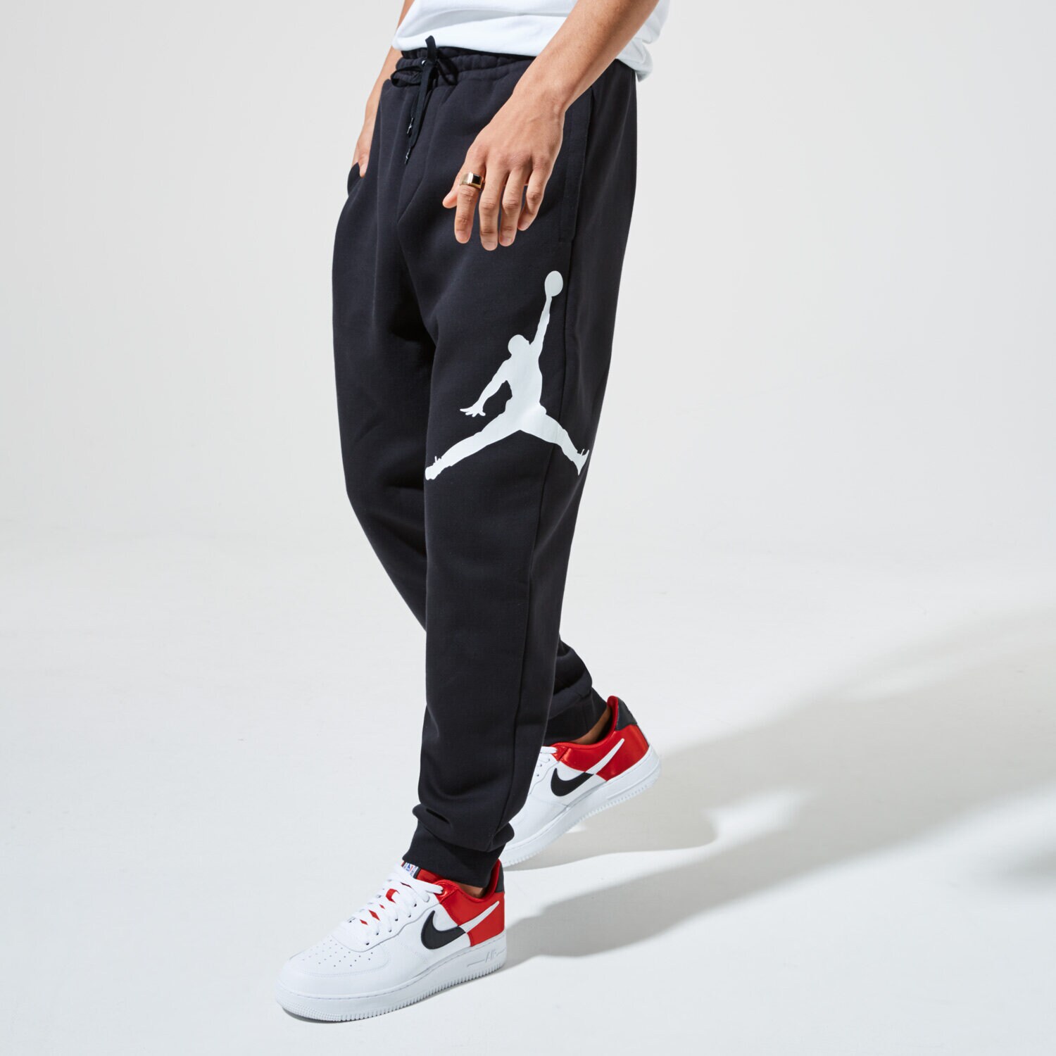 pánské kalhoty JORDAN KALHOTY  M J JUMPMAN LOGO FLC PANT BQ8646-010 ČERNÁ
