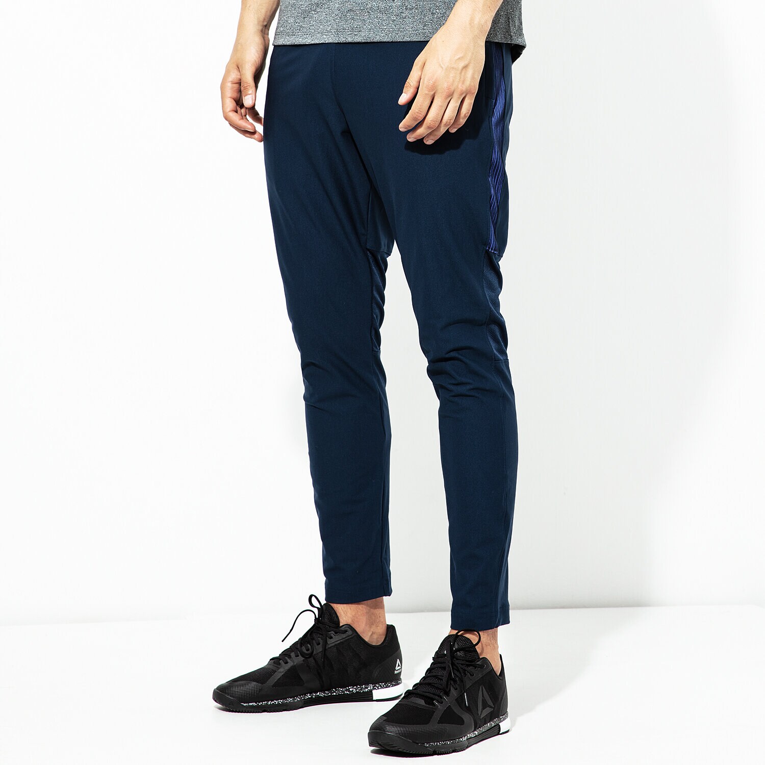 pánské kalhoty UNDER ARMOUR KALHOTY  THREADBORNE VANISH PANT 1309828-408 TMAVOMODRÁ