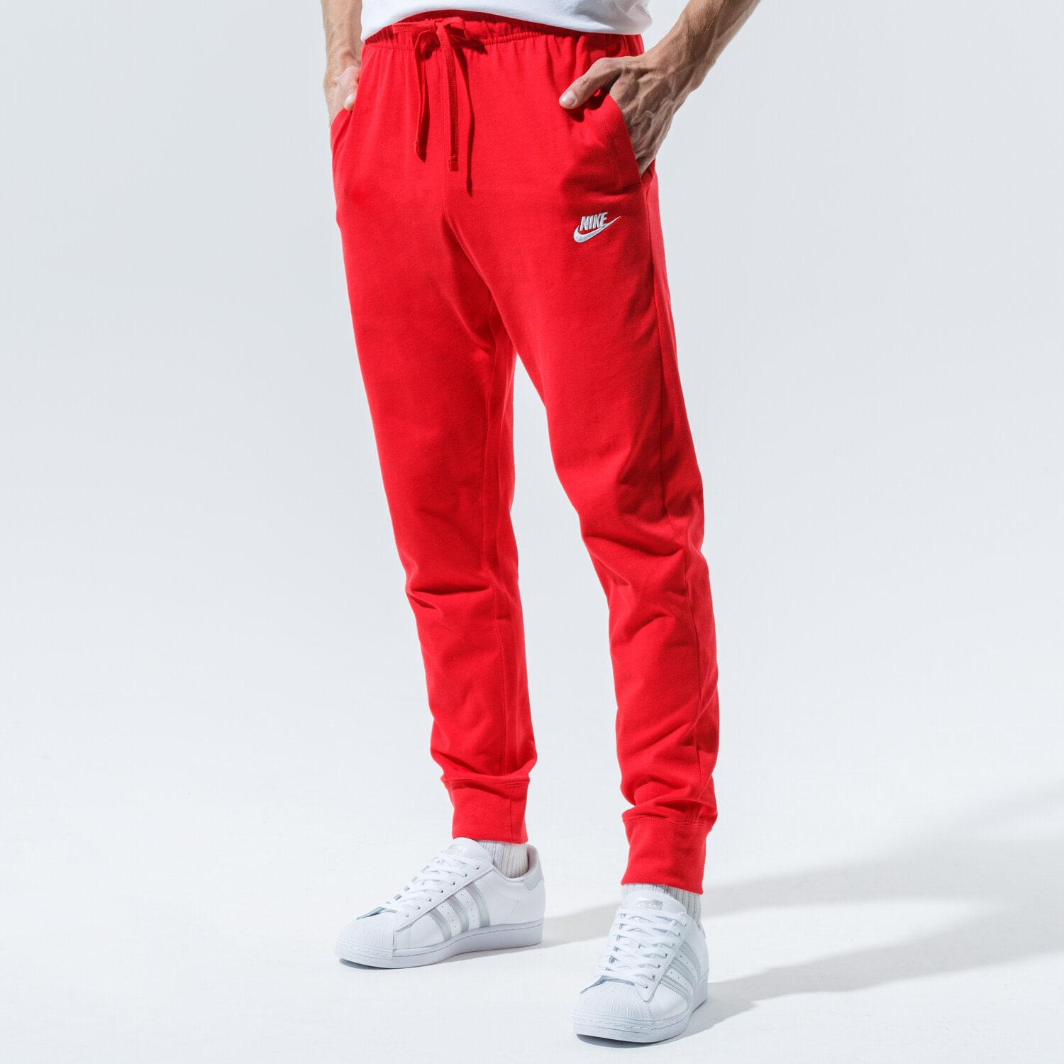 pánské kalhoty NIKE KALHOTY  M NSW CLUB JGGR JSY BV2762-657 ČERVENÁ