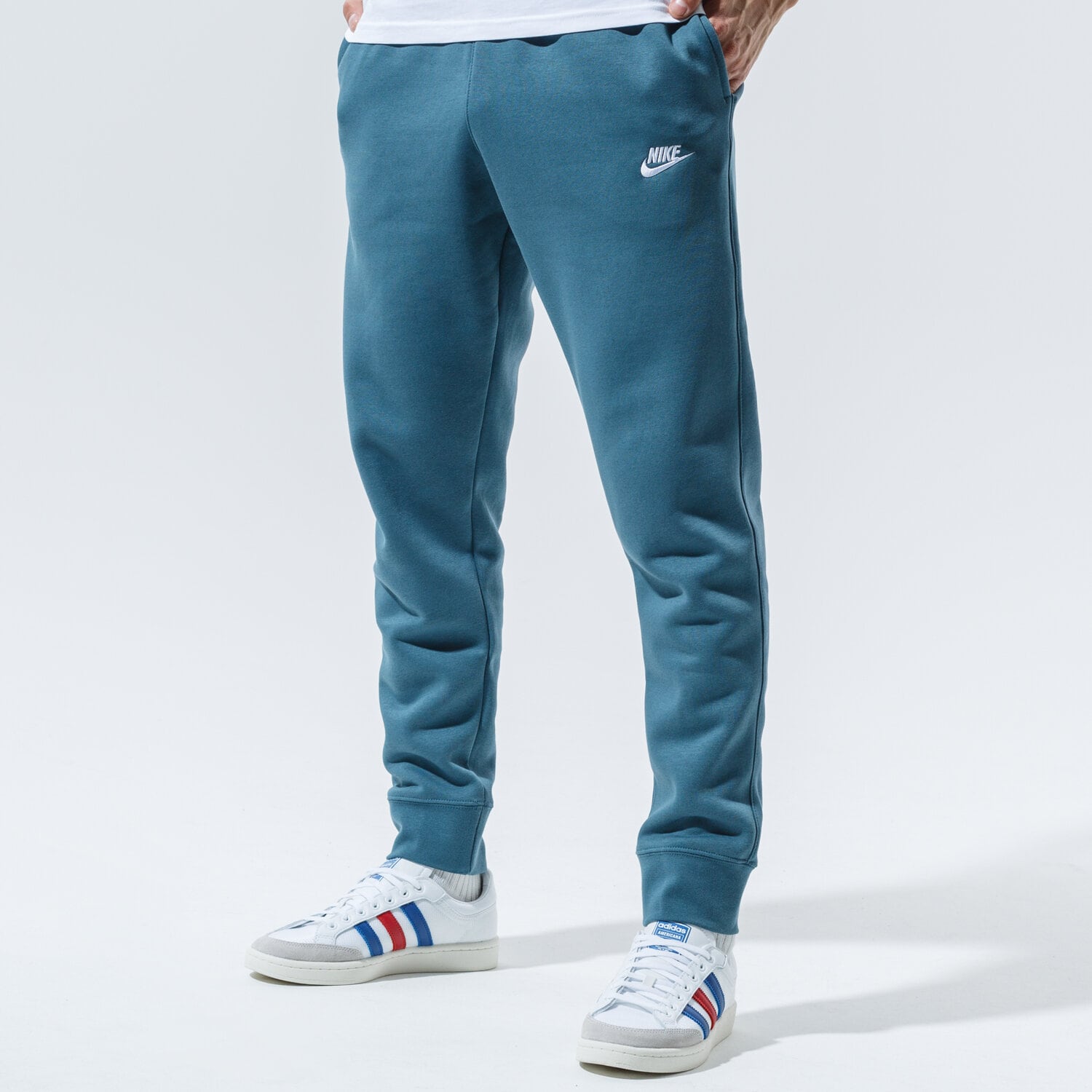 pánské kalhoty NIKE KALHOTY  SPORTSWEAR CLUB FLEECE BV2671-058 MODRÁ