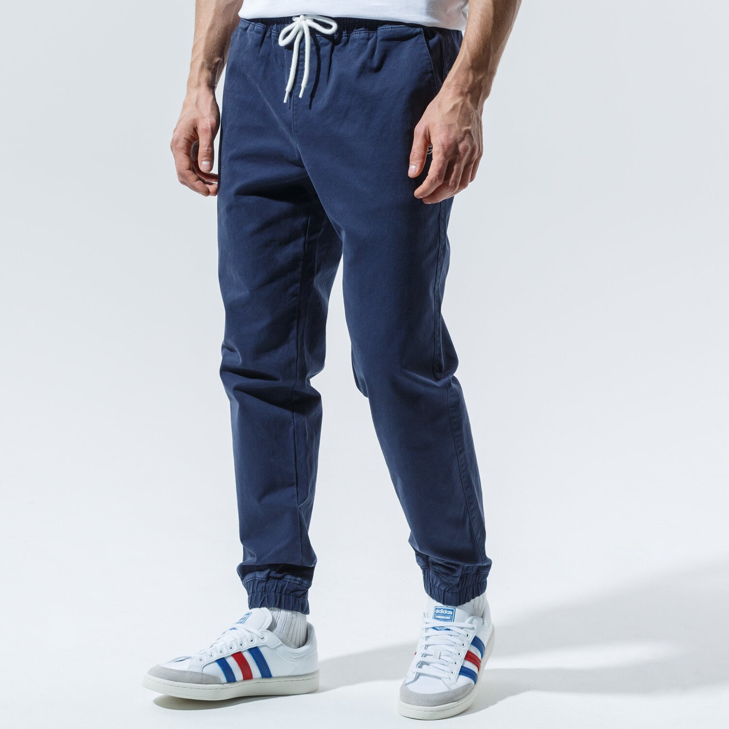 pánské kalhoty CHAMPION KALHOTY  ELASTIC CUFF PANTS 215193BS538 TMAVOMODRÁ