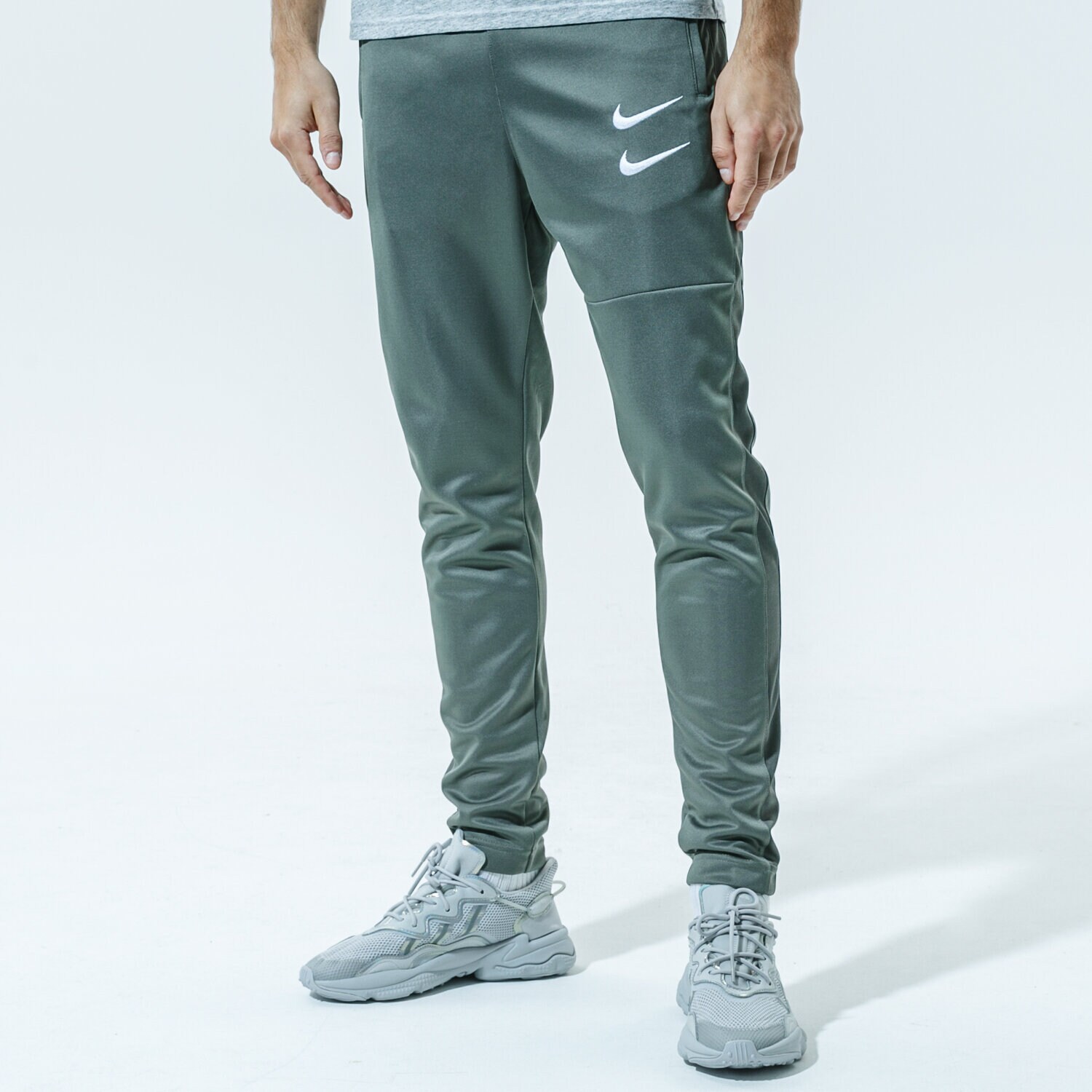 pánské kalhoty NIKE KALHOTY  M NSW SWOOSH PANT PK CU3898-380 ZELENÁ
