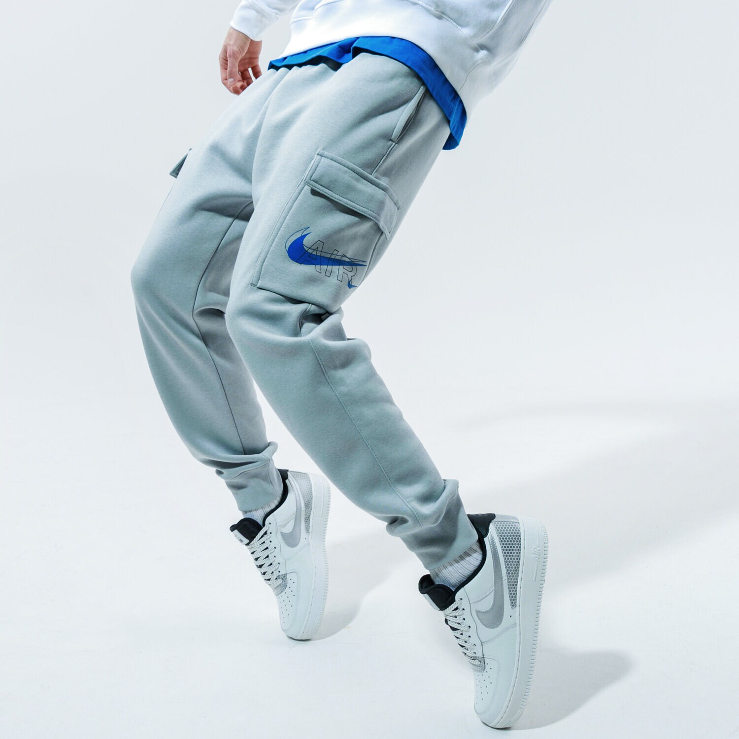 pánské kalhoty NIKE KALHOTY  M NSW PANT CARGO AIR PRNT PACK DD9696-077 ŠEDÁ