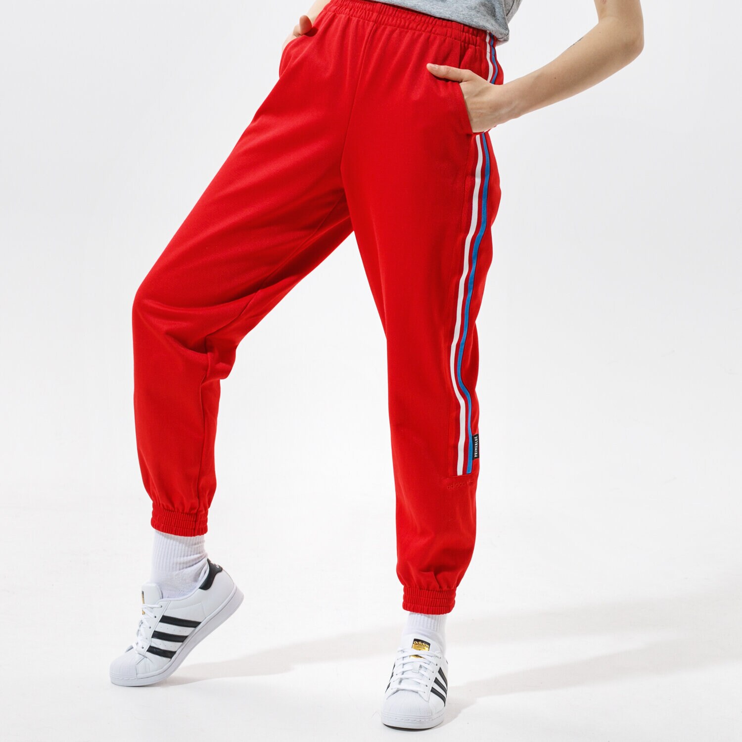 dámské kalhoty ADIDAS KALHOTY  TRACKPANT PB GN6981 ČERVENÁ
