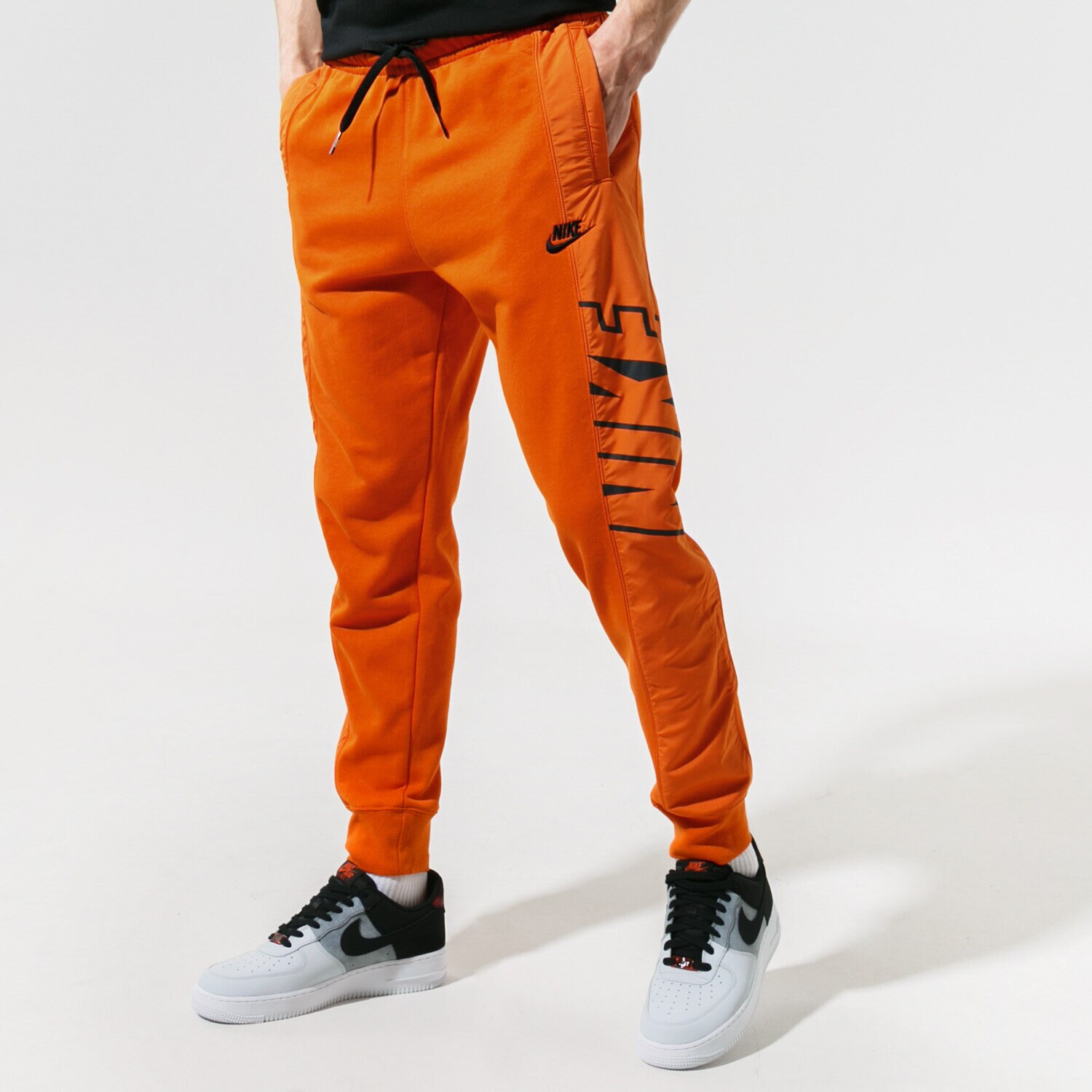pánské kalhoty NIKE KALHOTY  SPORTSWEAR CZ9942-893 ORANŽOVÁ