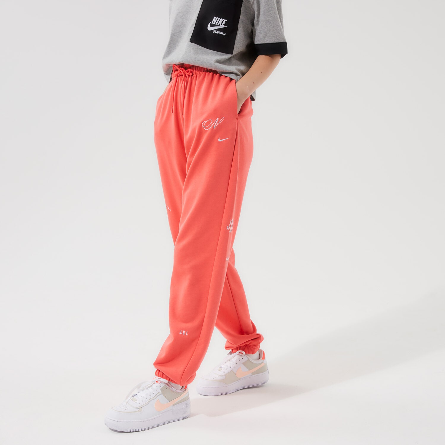 dámské kalhoty NIKE KALHOTY  W NSW ICN CLSH FLC GX HR JGGR DD5042-814 korálová
