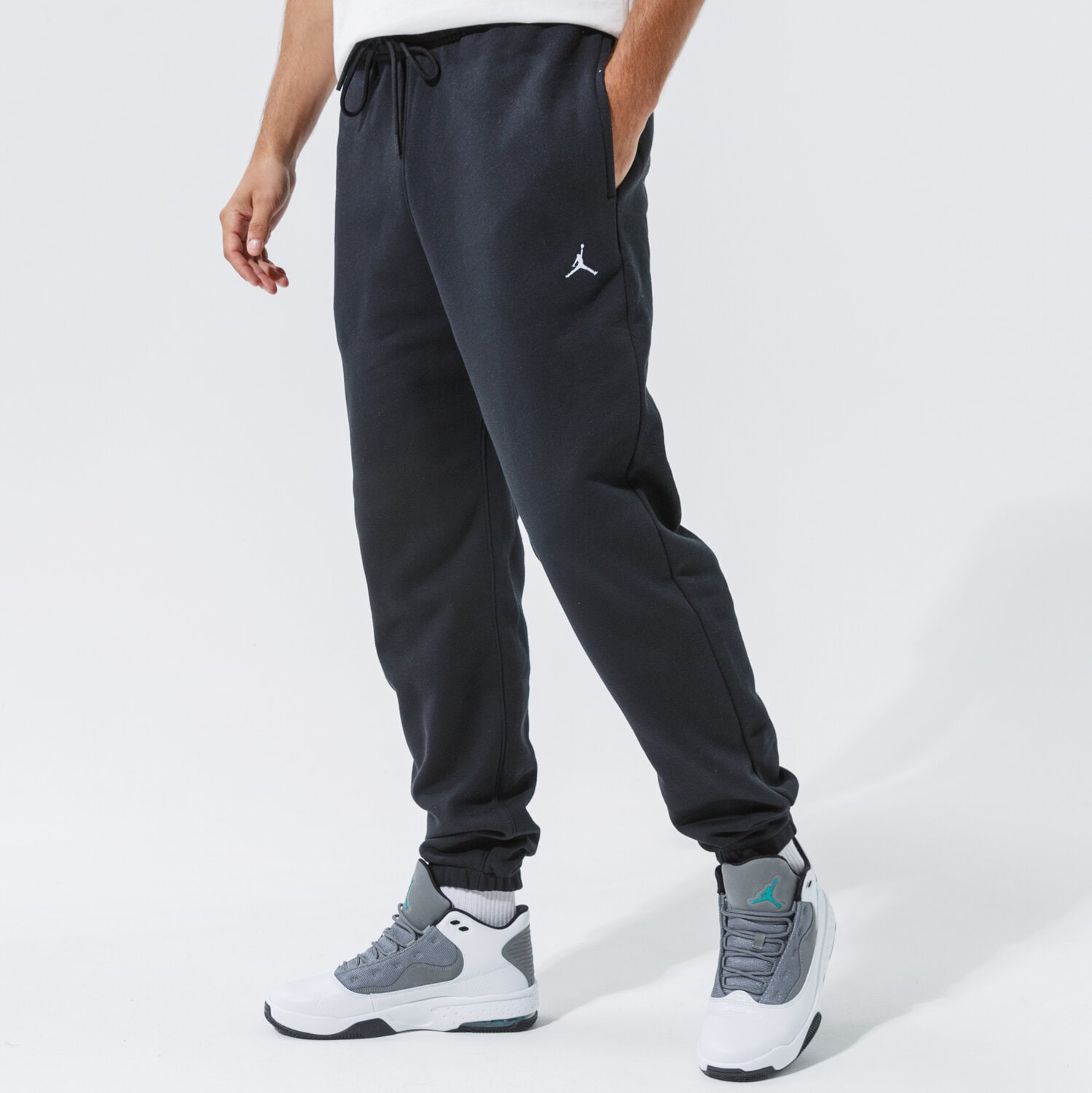 pánské kalhoty JORDAN KALHOTY  ESSENTIAL FLEECE JOGGERS DA9820-010 ČERNÁ