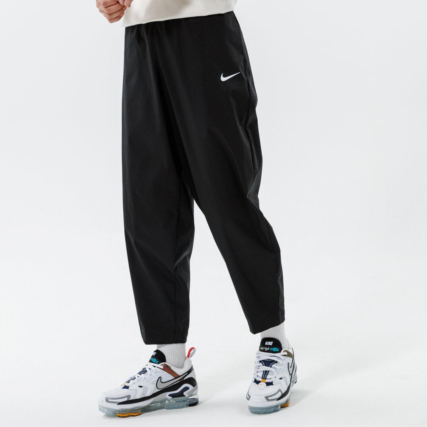 dámské kalhoty NIKE KALHOTY  W NSW ESSNTL WVN HR PNT CRV DD5975-010 ČERNÁ