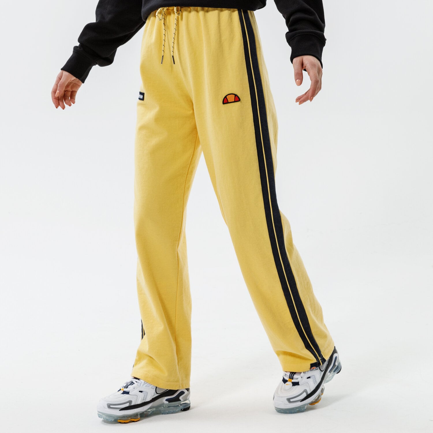 dámské kalhoty ELLESSE KALHOTY  ATER TRACK PANT YELLOW SGK12166606 ŽLUTÁ