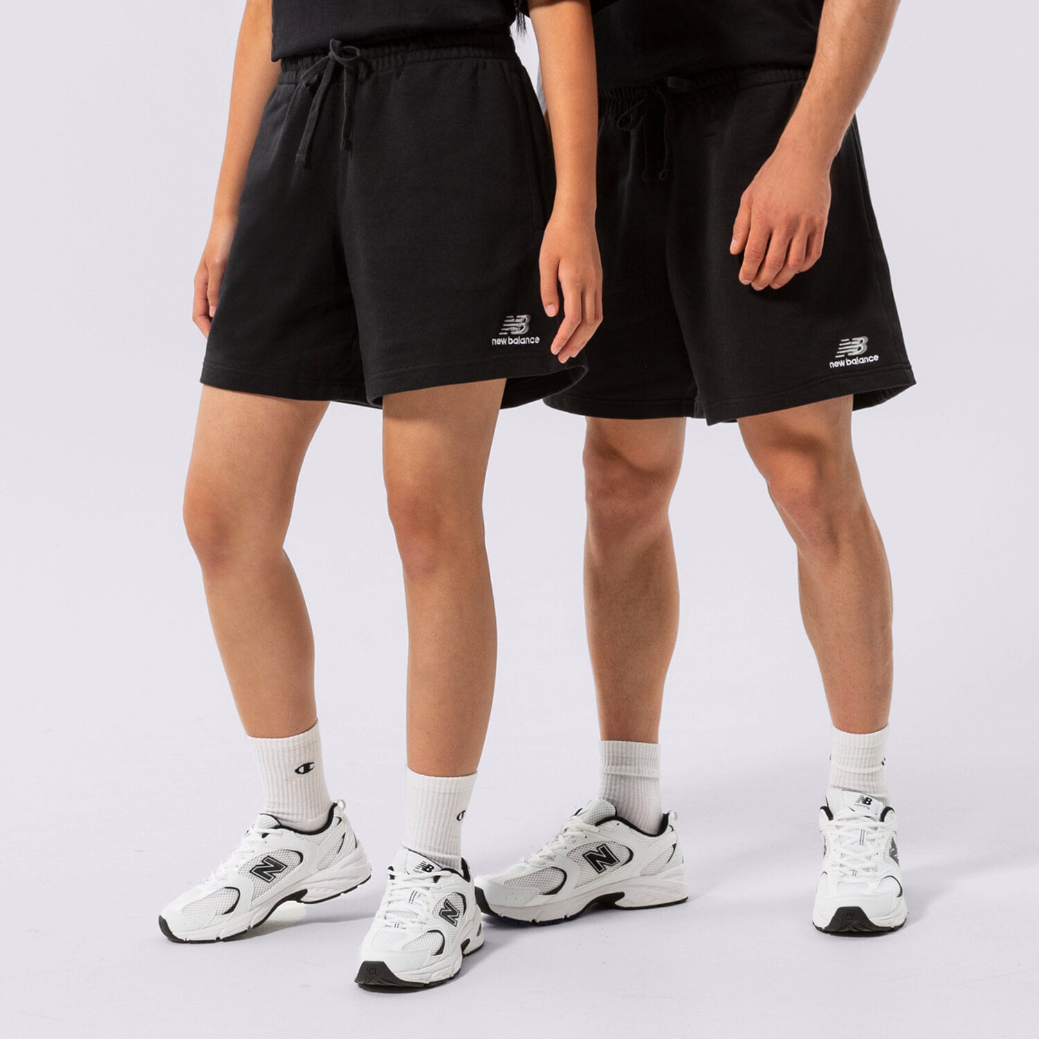 dámské kraťasy NEW BALANCE ŠORTKY  NB ESSENTIALS UNI-SSENTIALS FLEECE SHORT US21500BK ČERNÁ