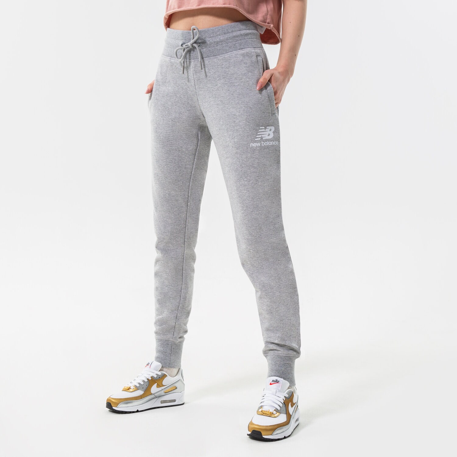 dámské kalhoty NEW BALANCE KALHOTY  NB ESSENTIALS FRENCH TERRY SWEATPANT WP03530AG ŠEDÁ