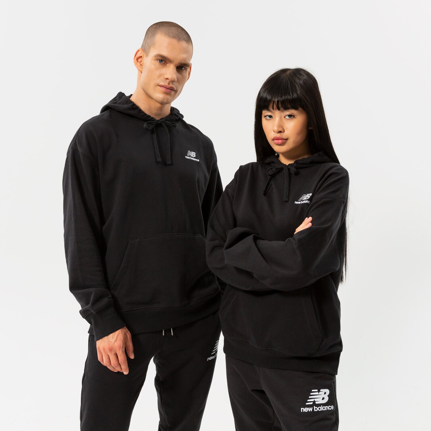 dámská mikina NEW BALANCE MIKINA S KAPUCÍ NB ESSENTIALS UNI-SSENTIALS PO H UT21500BK ČERNÁ