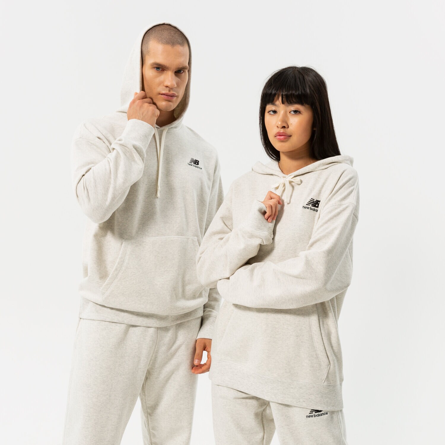 dámská mikina NEW BALANCE MIKINA S KAPUCÍ NB ESSENTIALS UNI-SSENTIALS PO H UT21500SAH ŠEDÁ