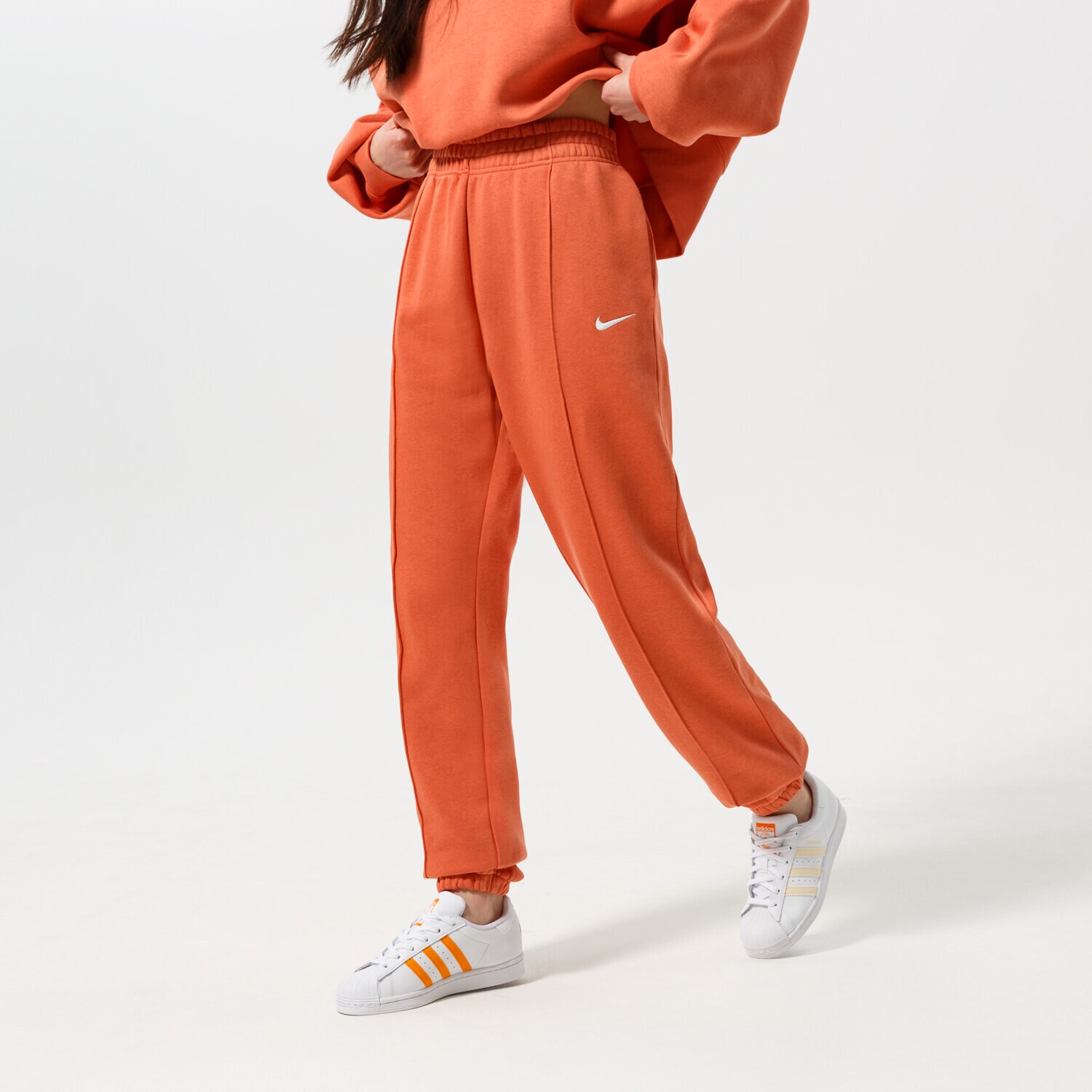 dámské kalhoty NIKE KALHOTY  SPORTSWEAR ESSENTIAL BV4089-827 ORANŽOVÁ