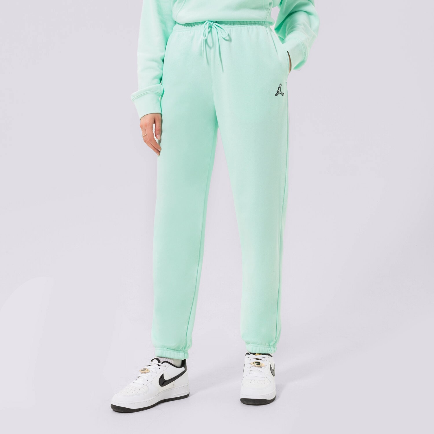 dámské kalhoty JORDAN KALHOTY  ESSENTIAL JOGGERS DN4575-379 mátová