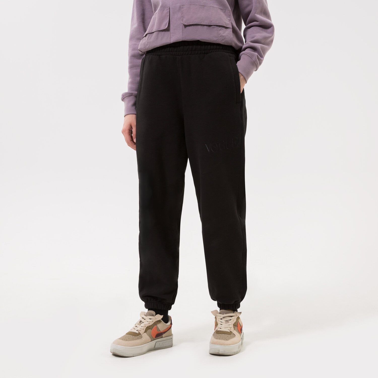 dámské kalhoty PUMA KALHOTY  PUMA X VOGUE SWEATPANTS TR BLACK 534694-01 ČERNÁ