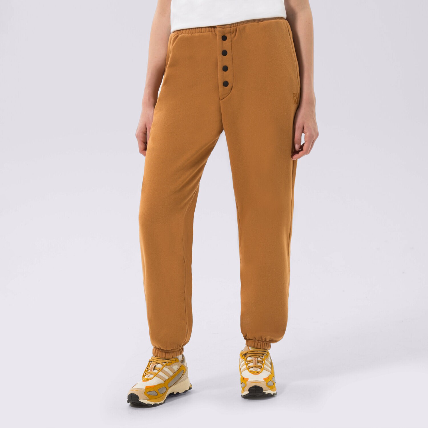 dámské kalhoty PUMA KALHOTY  PUMA INFUSE SWEATPANTS 535644-74 hořčicová