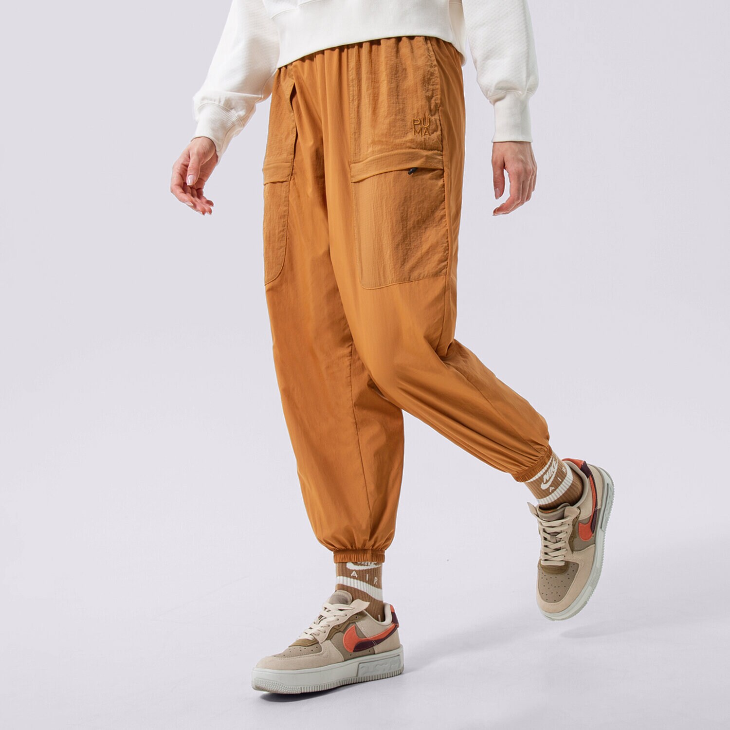 dámské kalhoty PUMA KALHOTY  PUMA INFUSE WOVEN PANTS 536106-74 ŽLUTÁ