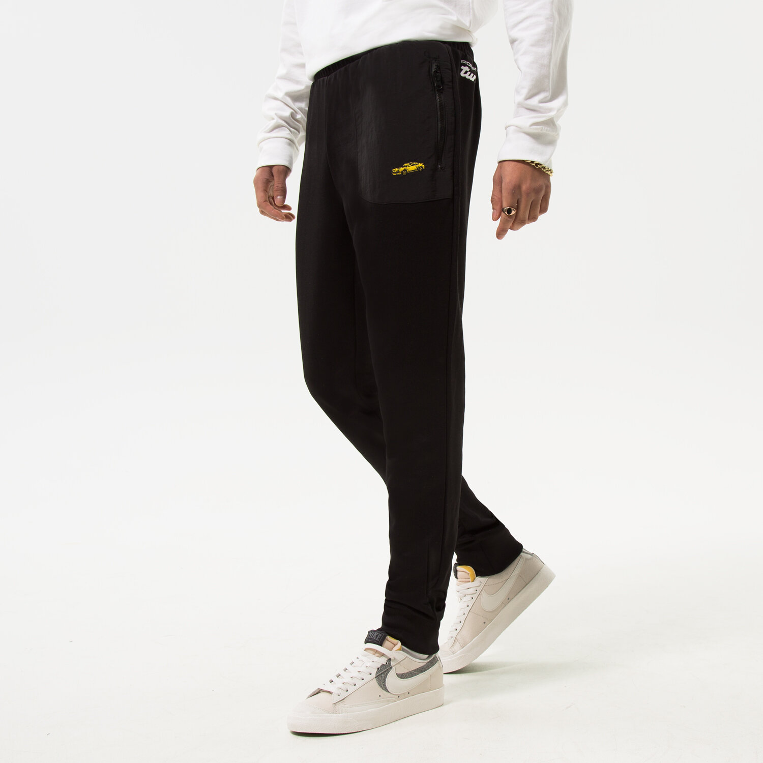 pánské kalhoty PUMA KALHOTY  PUMA PL SWEAT PANTS 534828-01 ČERNÁ
