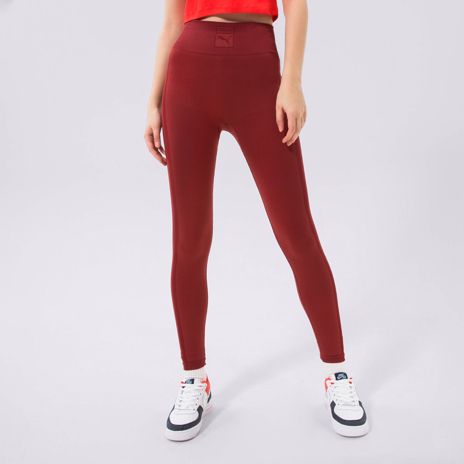 dámské kalhoty PUMA LEGGINGS PUMA X VOGUE SEAMLESS LEGGINGS 536694-22 ČERVENÁ