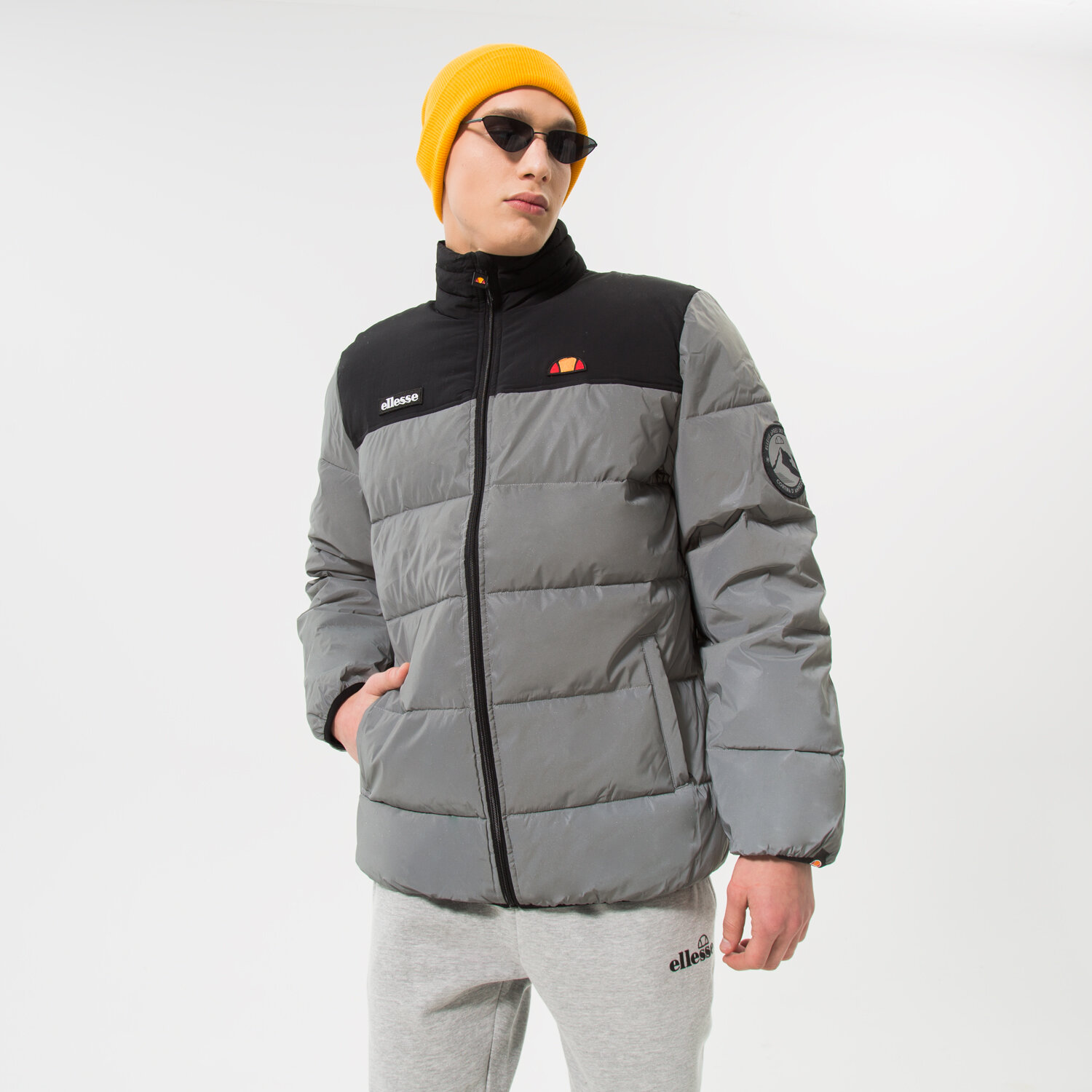 pánská zimní bunda ELLESSE BUNDA PÉŘOVÁ NEBULA JACKET BLK/RFLCTV SHK12789037 ČERNÁ