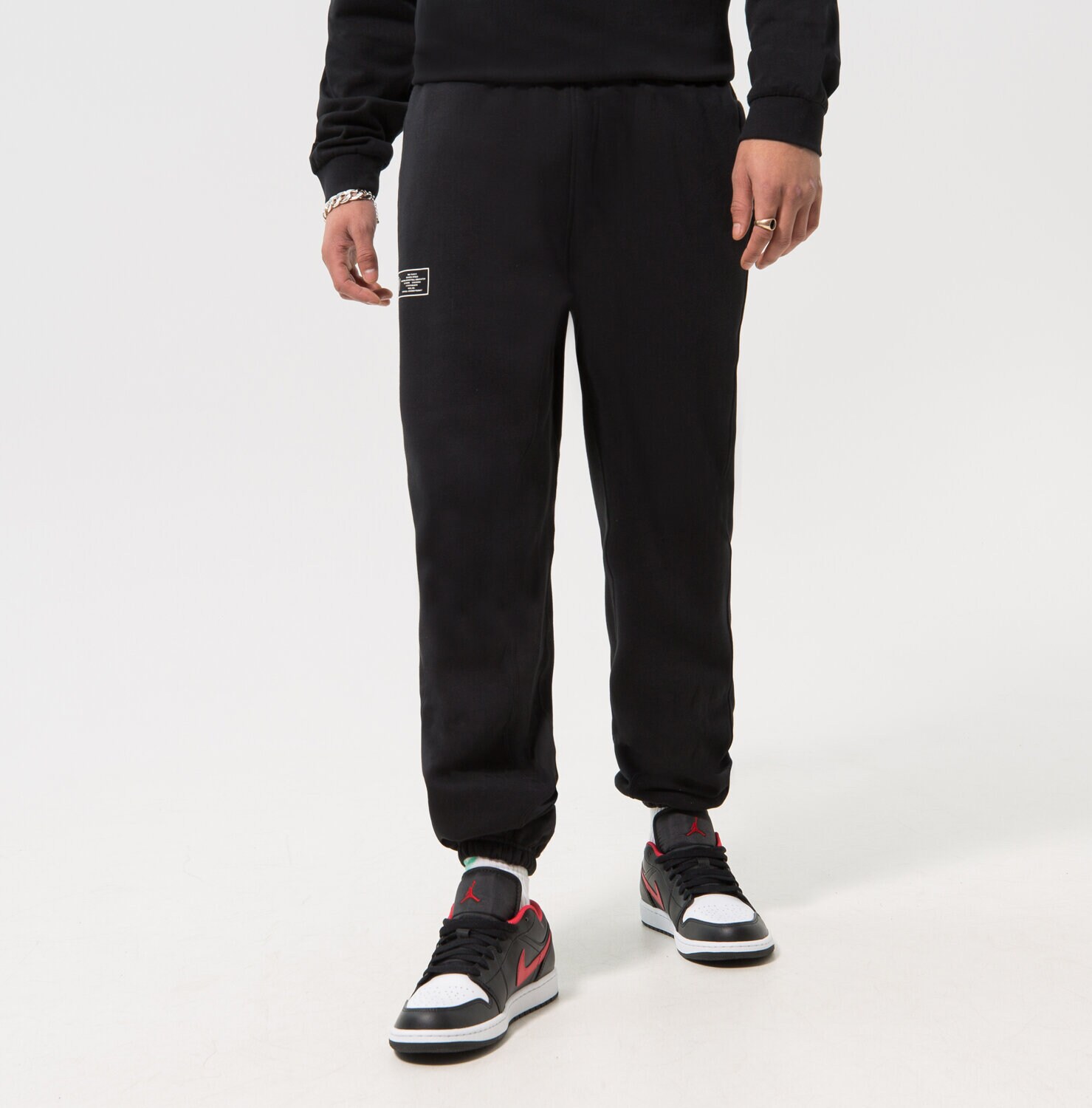 pánské kalhoty NIKE KALHOTY  N31 M NK PANT FLC CTS 23 NBA DR9105-010 ČERNÁ